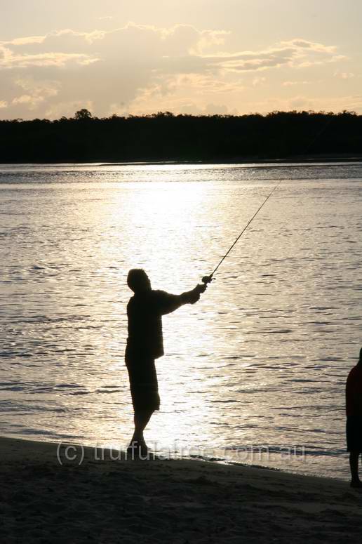 Fishing at sunset in Noosa