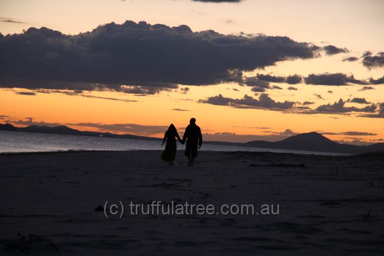 Couple on the beach at Sunset, Great Keppel Island